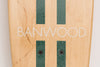 Banwood Skateboard - Natuurkleurig skateboard met donkergroene strepen voor kinderen vanaf 3 jaar - Verkrijgbaar bij Littlefashionaddict.com