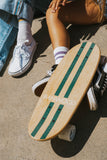 Banwood Skateboard - Natuurkleurig skateboard met donkergroene strepen voor kinderen vanaf 3 jaar - Verkrijgbaar bij Littlefashionaddict.com