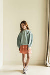 Meisjes sweater van Jenest in pastelblauw met ballonmouwen en sterdetail | verkrijgbaar bij Little Fashion Addict