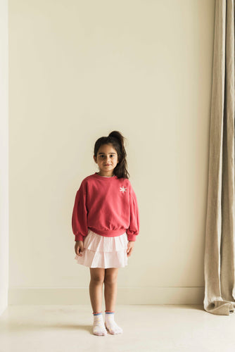 Framboosroze sweater voor meisjes van Jenest met ballonmouwen en sterdetail | verkrijgbaar bij Little Fashion Addict