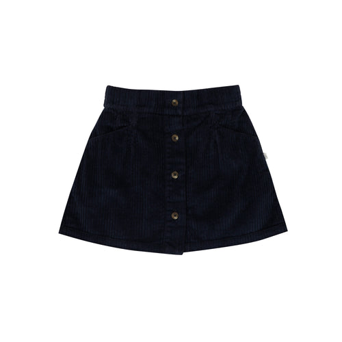 Jenest Bibi Skirt Navy Blue – Donkerblauw ribfluwelen meisjesrokje met knoopsluiting en steekzakken, verkrijgbaar bij Little Fashion Addict