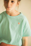 Meisjest-shirt in aqua groen van Jenest met roze LOVE-print op de rug | Livia T-shirt Aqua Green | verkrijgbaar bij Little Fashion Addict