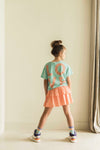 Meisjest-shirt in aqua groen van Jenest met roze LOVE-print op de rug | Livia T-shirt Aqua Green | verkrijgbaar bij Little Fashion Addict