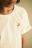 Unisex T-shirt van Jenest in zonnig geel met streepjes | Nurture T-shirt Sunny Yellow Stripe | Verkrijgbaar voor jongens en meisjes van 4 tot 10 jaar bij Little Fashion Addict