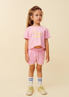 Terry sport short in oudroze van Sproet & Sprout voor meisjes, met gele biesjes en geborduurd ijsje | Uit de Champions League of Fun collectie 