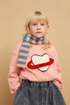 Lichtroze meisjessweater met Heart Saturn print van Sproet & Sprout | Sweatshirt Heart Saturn - Peach Parfait |  A Cosmic Romance collectie