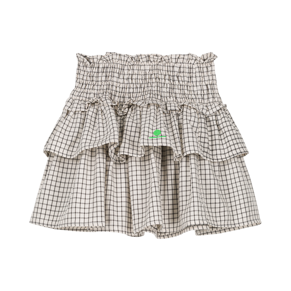 Wit Leonie rokje met zwart vierkantenpatroon van We Are Kids. | Verkrijgbaar bij Little Fashion Addict