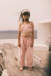 Pantalon Elia Pink Checks van We Are Kids – Vrolijke lichtroze meisjesbroek met ruitjespatroon, gemaakt van biologisch katoen | Verkrijgbaar bij Little Fashion Addict